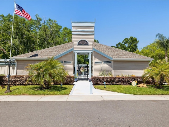 11536 Golden Rain Dr, New Port Richey, FL 34654 - view of building exterior featuring fence