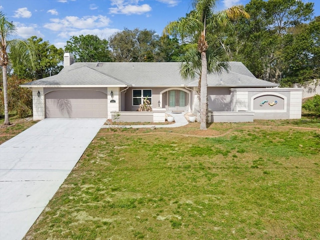 5411 Joyner Ave, Spring Hill, FL 34608 - single story home with a chimney, stucco siding, an attached garage, concrete driveway, and a front yard