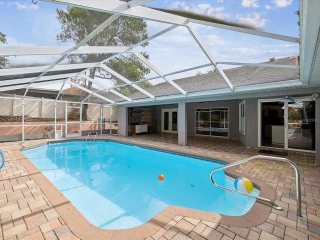 5411 Joyner Ave, Spring Hill, FL 34608 - pool with glass enclosure, french doors, and a patio