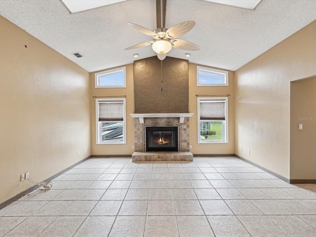 5411 Joyner Ave, Spring Hill, FL 34608 - unfurnished living room featuring lofted ceiling, visible vents, a ceiling fan, and a healthy amount of sunlight