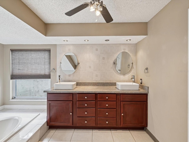 5411 Joyner Ave, Spring Hill, FL 34608 - full bathroom featuring a sink, a textured ceiling, and ceiling fan