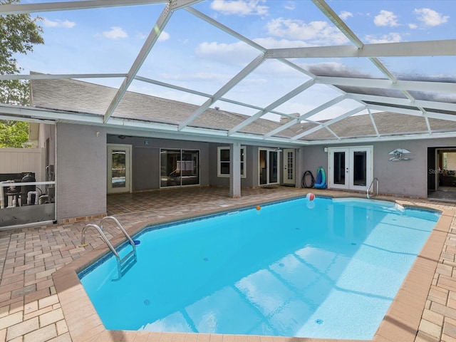 5411 Joyner Ave, Spring Hill, FL 34608 - pool with a lanai, a patio area, and french doors
