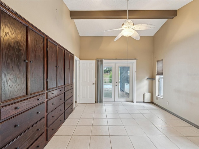 5411 Joyner Ave, Spring Hill, FL 34608 - interior space with french doors, beamed ceiling, a ceiling fan, high vaulted ceiling, and light tile patterned floors