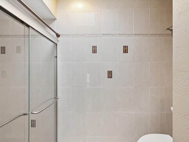 5411 Joyner Ave, Spring Hill, FL 34608 - full bath with a shower stall and toilet
