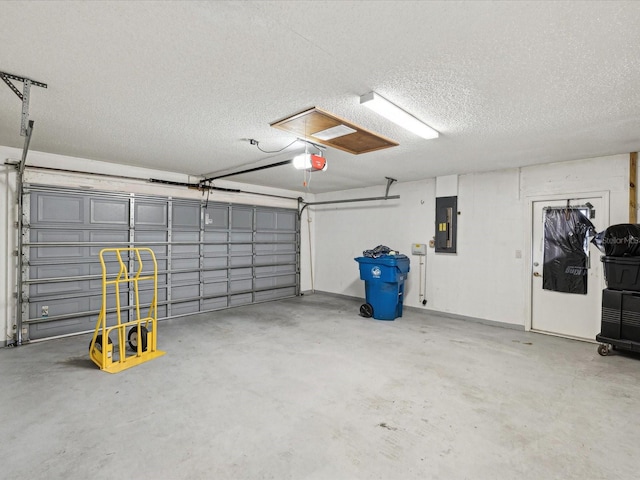 5411 Joyner Ave, Spring Hill, FL 34608 - garage with electric panel and a garage door opener