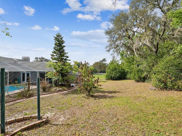 5411 Joyner Ave, Spring Hill, FL 34608 - view of yard with a lanai and an outdoor pool