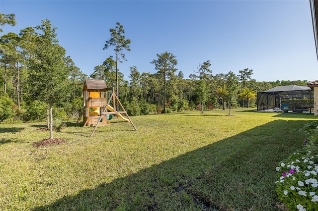 5070 Night Star Trl, Odessa, FL 33556 - view of green lawn with a playground