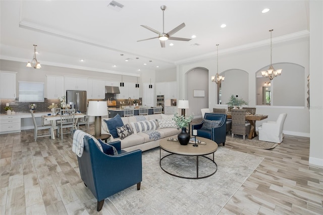 5070 Night Star Trl, Odessa, FL 33556 - living area featuring a chandelier, ornamental molding, a ceiling fan, recessed lighting, and light wood-type flooring