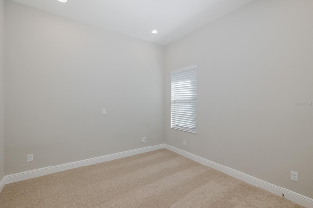 5070 Night Star Trl, Odessa, FL 33556 - empty room featuring light carpet, baseboards, and recessed lighting