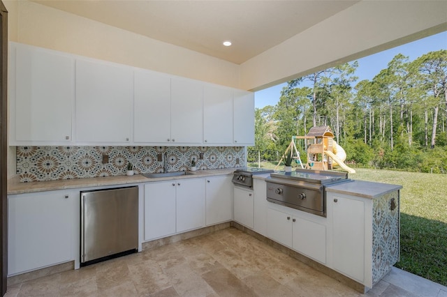 5070 Night Star Trl, Odessa, FL 33556 - view of patio / terrace featuring a sink and a playground