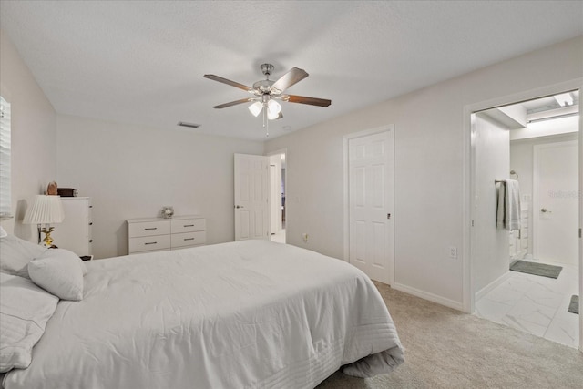 4504 Dewey Dr, New Port Richey, FL 34652 - bedroom with ensuite bath and ceiling fan