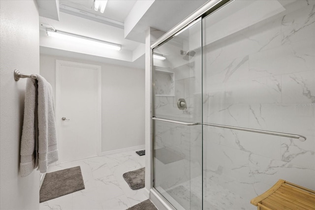 4504 Dewey Dr, New Port Richey, FL 34652 - bathroom with marble look tile flooring and a marble finish shower