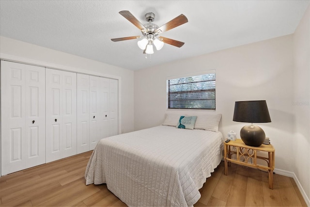 4504 Dewey Dr, New Port Richey, FL 34652 - bedroom featuring light wood finished floors, a closet, and a ceiling fan