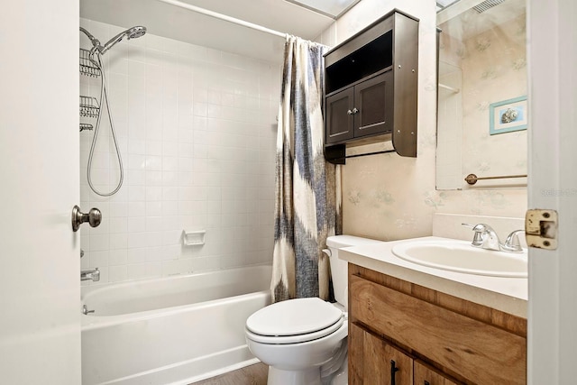 full bathroom with wood finished floors, toilet, vanity, and shower / bath combination with curtain