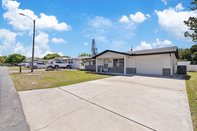 4607 Kennedy Dr, New Port Richey, FL 34652 - ranch-style home with concrete driveway, an attached garage, a porch, cooling unit, and a front yard