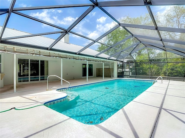 pool featuring a patio area