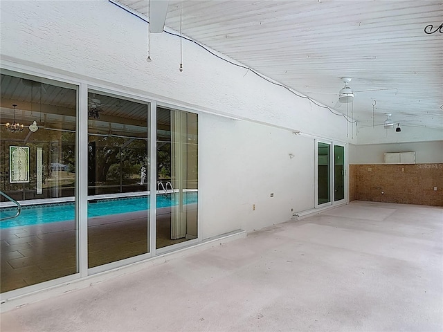 view of patio with an outdoor pool