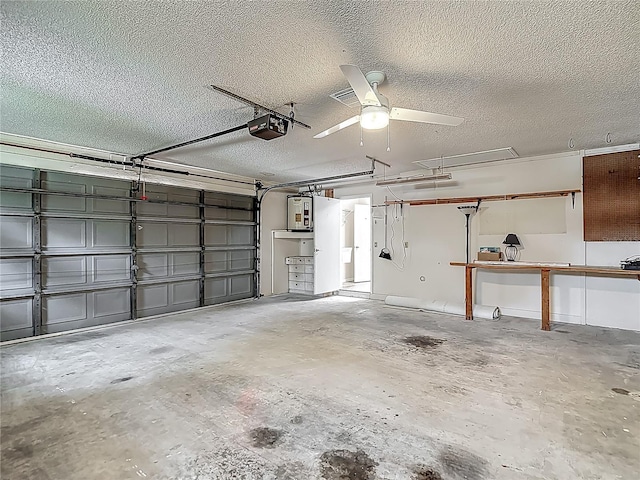 garage with water heater, a ceiling fan, and a garage door opener