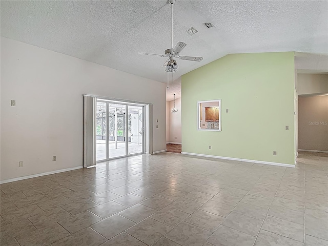 unfurnished room with vaulted ceiling, visible vents, baseboards, a textured ceiling, and ceiling fan