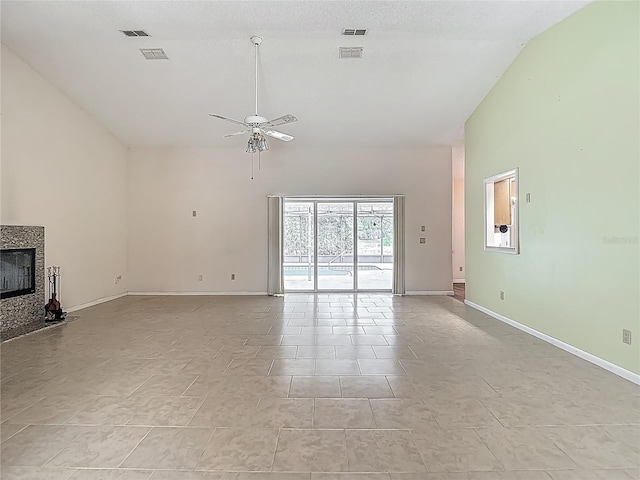 unfurnished living room featuring high vaulted ceiling, a ceiling fan, visible vents, and a tiled fireplace