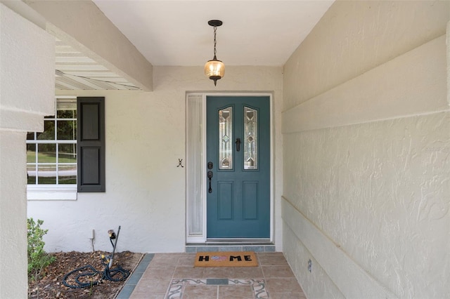 6095 W Douneray Loop, Crystal River, FL 34429 - doorway to property featuring stucco siding