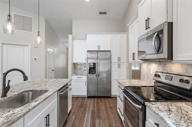 6095 W Douneray Loop, Crystal River, FL 34429 - kitchen featuring visible vents, appliances with stainless steel finishes, dark wood-style flooring, and a sink