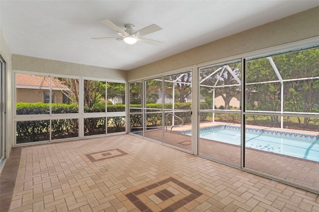 6095 W Douneray Loop, Crystal River, FL 34429 - unfurnished sunroom featuring ceiling fan
