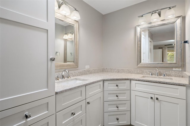 6095 W Douneray Loop, Crystal River, FL 34429 - full bathroom featuring a sink and double vanity