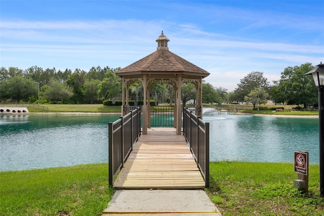 6095 W Douneray Loop, Crystal River, FL 34429 - dock area featuring a gazebo, a lawn, and a water view