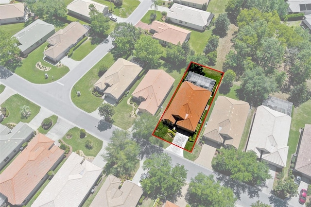 birds eye view of property with a residential view