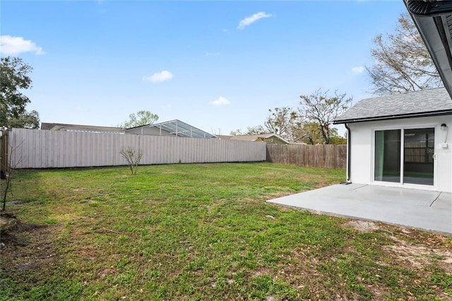 view of yard featuring a fenced backyard and a patio area