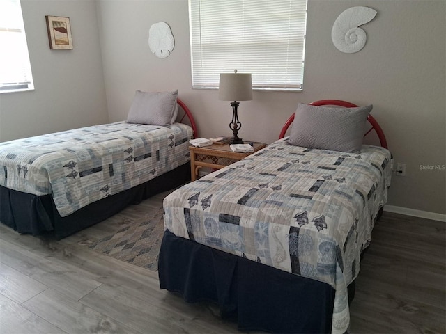 7508 Cypress Knee Dr, Hudson, FL 34667 - bedroom featuring wood finished floors