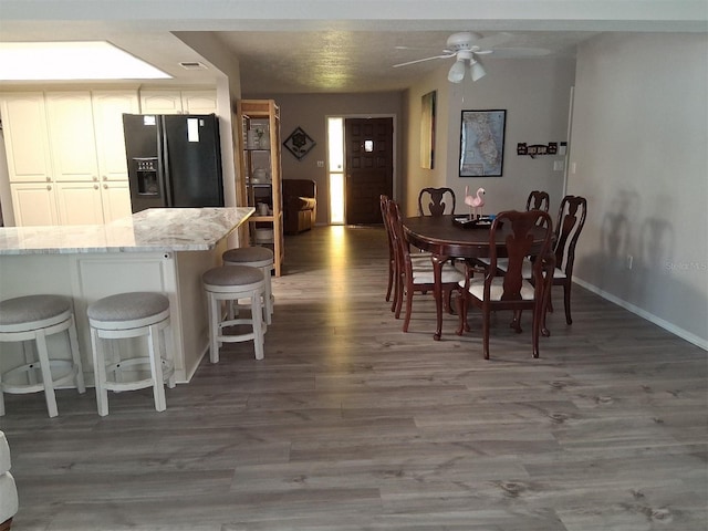 7508 Cypress Knee Dr, Hudson, FL 34667 - dining room with wood finished floors and ceiling fan