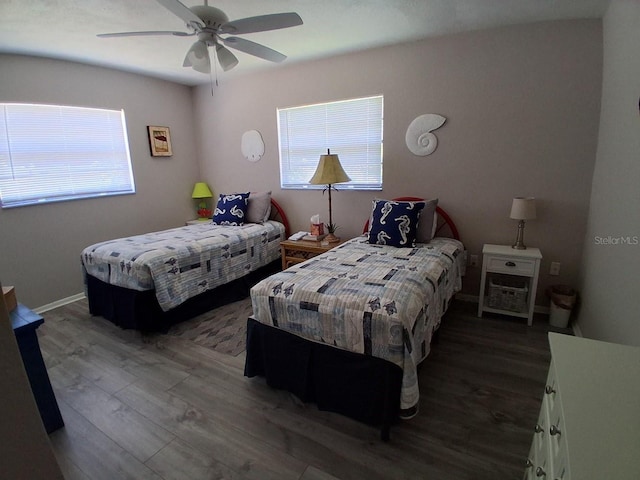 7508 Cypress Knee Dr, Hudson, FL 34667 - bedroom featuring multiple windows, wood finished floors, and ceiling fan