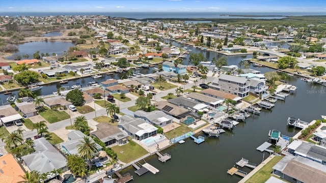 5106 Blue Heron Dr, New Port Richey, FL 34652 - drone / aerial view with a residential view and a water view