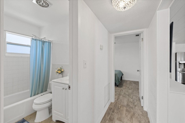 5106 Blue Heron Dr, New Port Richey, FL 34652 - interior space with shower / bathtub combination with curtain, visible vents, toilet, and vanity