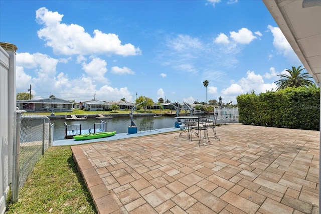 5106 Blue Heron Dr, New Port Richey, FL 34652 - view of patio / terrace with fence and a water view