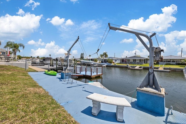5106 Blue Heron Dr, New Port Richey, FL 34652 - dock area with a yard, a water view, and boat lift