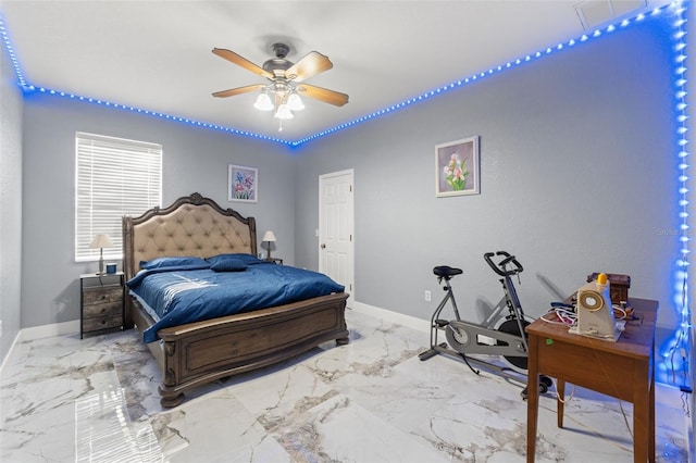 bedroom with baseboards, marble finish floor, and ceiling fan