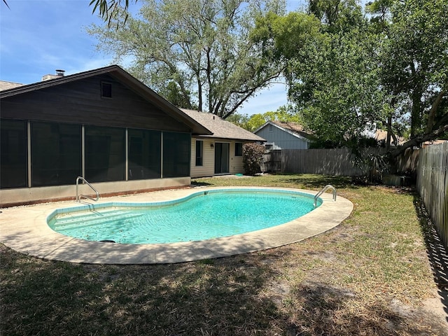 1412 Wexford Dr N, Palm Harbor, FL 34683 - view of pool with a lawn, a fenced in pool, a fenced backyard, and a sunroom