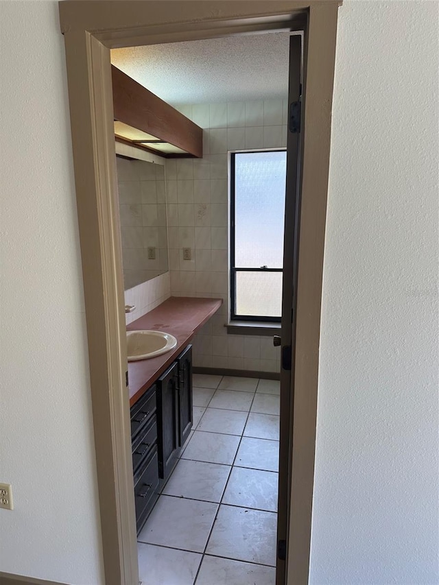 1412 Wexford Dr N, Palm Harbor, FL 34683 - bathroom featuring vanity and tile patterned floors