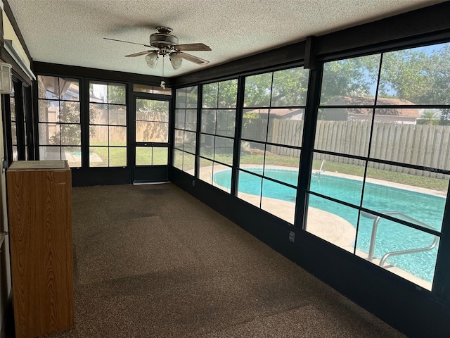 1412 Wexford Dr N, Palm Harbor, FL 34683 - unfurnished sunroom with ceiling fan