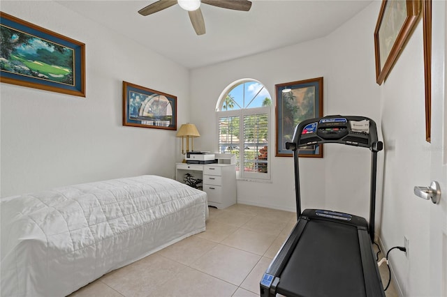 bedroom featuring light tile patterned floors, ceiling fan, and baseboards