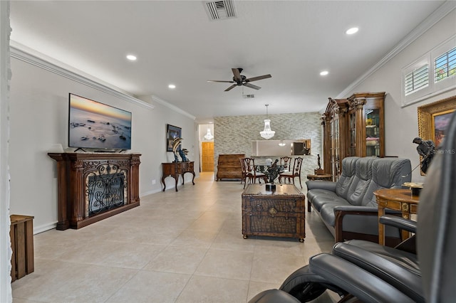 living room with a ceiling fan, ornamental molding, recessed lighting, light tile patterned flooring, and baseboards