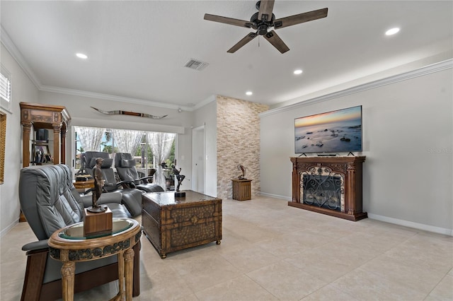 living area with crown molding, ceiling fan, recessed lighting, light tile patterned flooring, and a fireplace