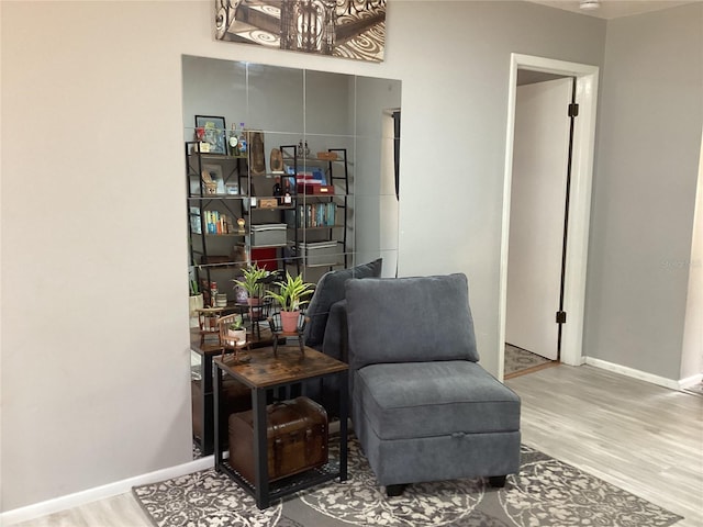 13111 Sheridan Dr, Hudson, FL 34667 - living area featuring wood finished floors and baseboards