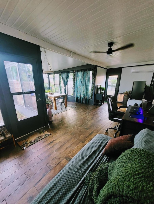 13111 Sheridan Dr, Hudson, FL 34667 - home office featuring wood-type flooring, healthy amount of natural light, and ceiling fan