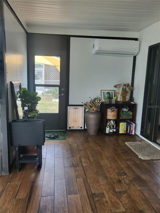 13111 Sheridan Dr, Hudson, FL 34667 - doorway to outside featuring a wall mounted AC, wood-type flooring, and radiator heating unit