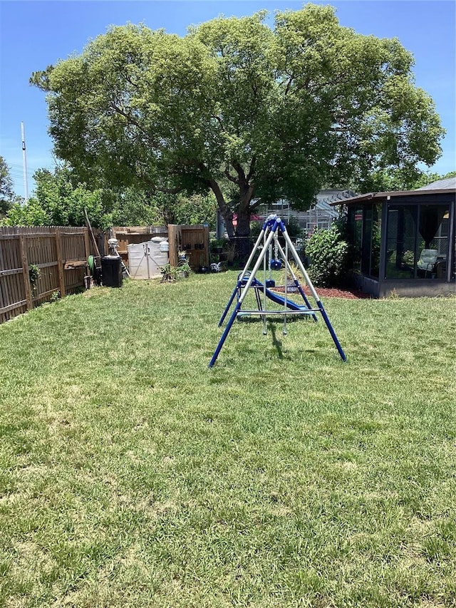 13111 Sheridan Dr, Hudson, FL 34667 - view of yard with a sunroom