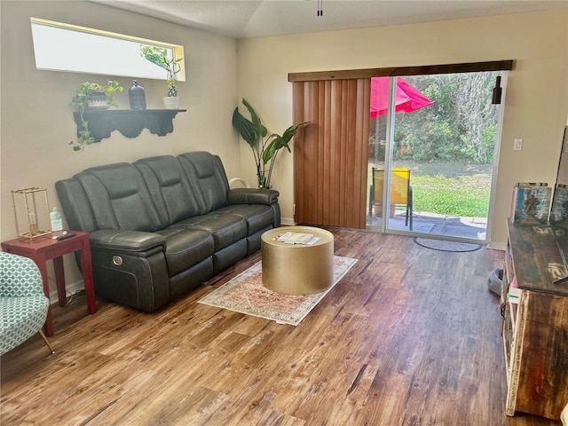 8604 Corinthian Way, New Port Richey, FL 34654 - living area with wood finished floors